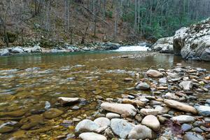 River Stones beside Swimming Hole River Stones beside Swimming Hole